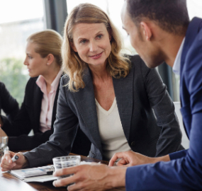 Several business people in a discussion.