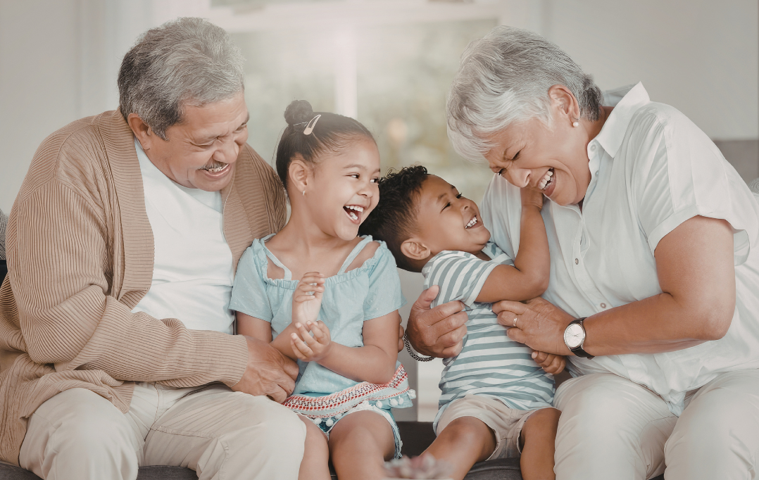 Grandparents playing with grandchildren